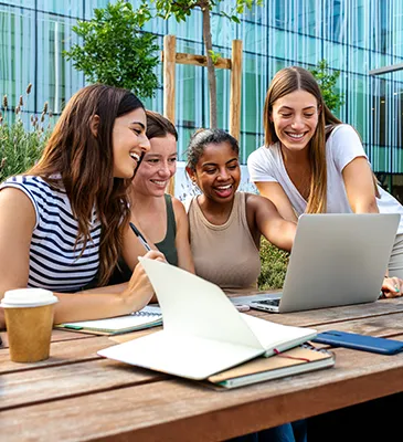 group of young women studying